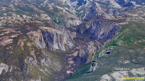 High altitude easterly view of the Merced River in Yosemite Valley.